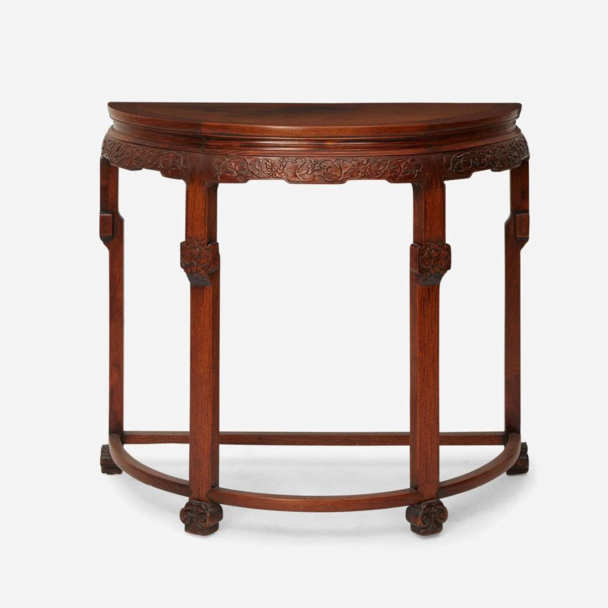 A Chinese carved hardwood demilune table 硬木月牙桌