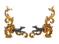 A Pair of Louis XV Style Gilt and Patinated Bronze Figural Chenets