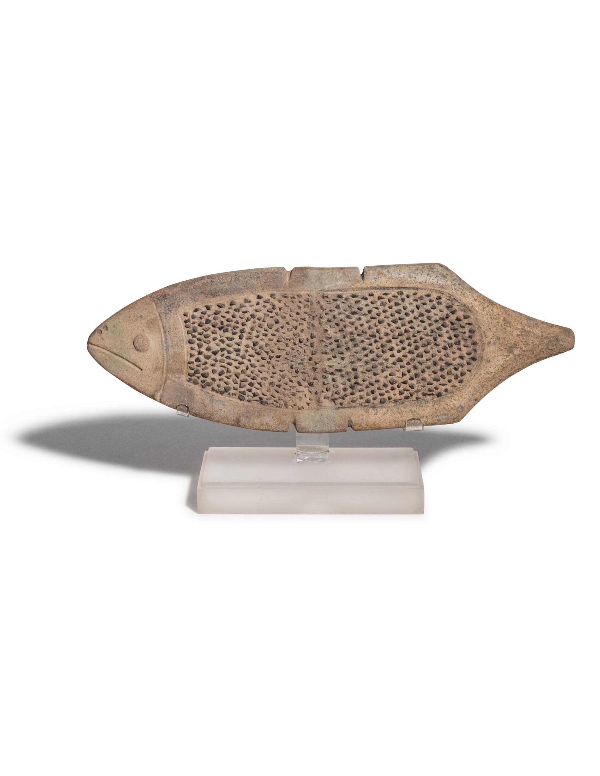 A La Tolita Pottery Grater in the Form of a Fish