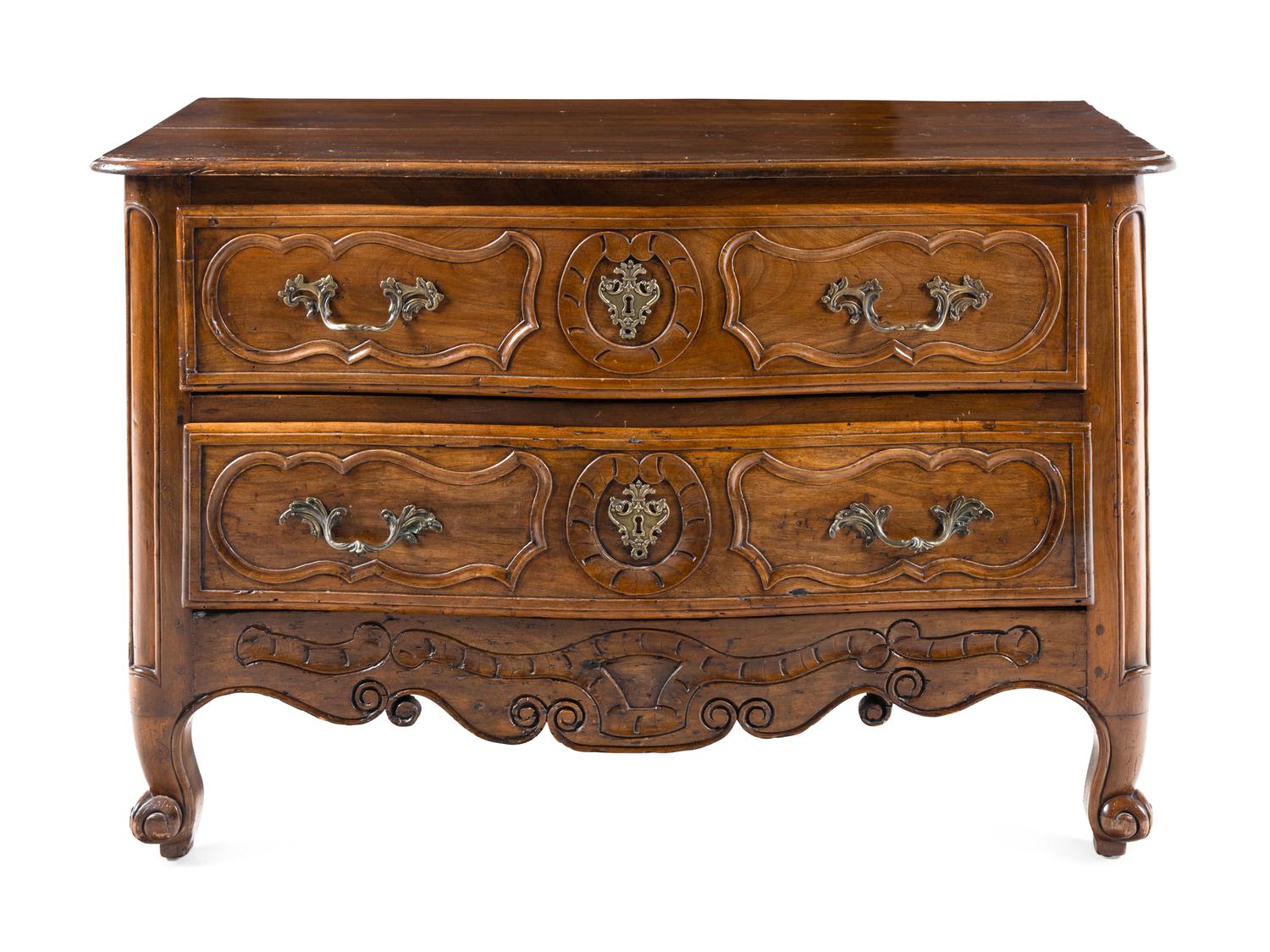 A Louis XV Walnut Commode