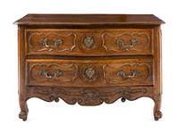 A Louis XV Walnut Commode