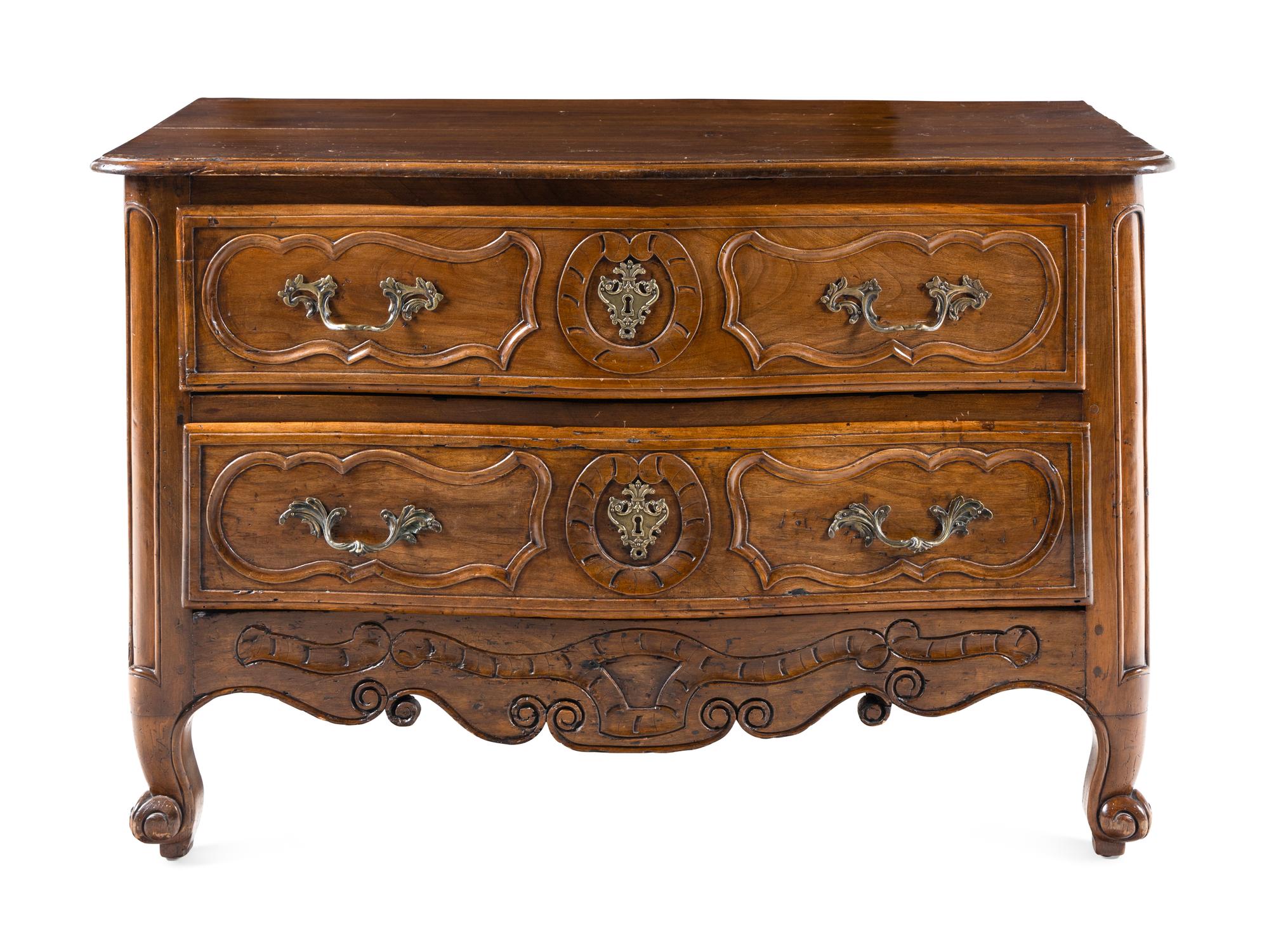 A Louis XV Walnut Commode