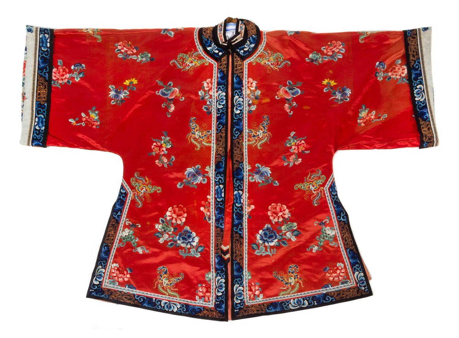 A Chinese Red Ground Embroidered Silk Lady's Robe and A Lady's Skirt Length of robe (collar to hem) 45 inches. — LATE QING DYNASTY