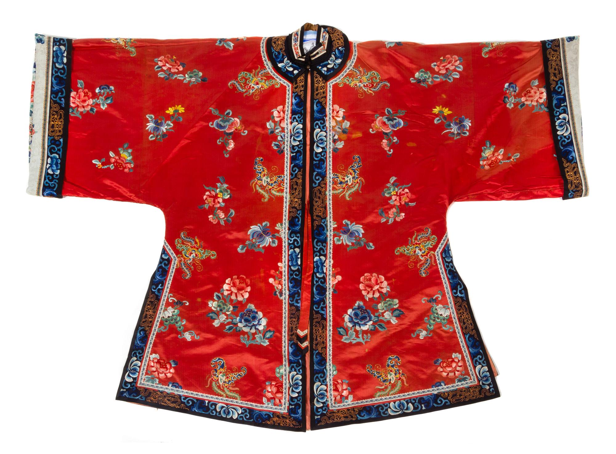 A Chinese Red Ground Embroidered Silk Lady's Robe and A Lady's Skirt Length of robe (collar to hem) 45 inches. — LATE QING DYNASTY