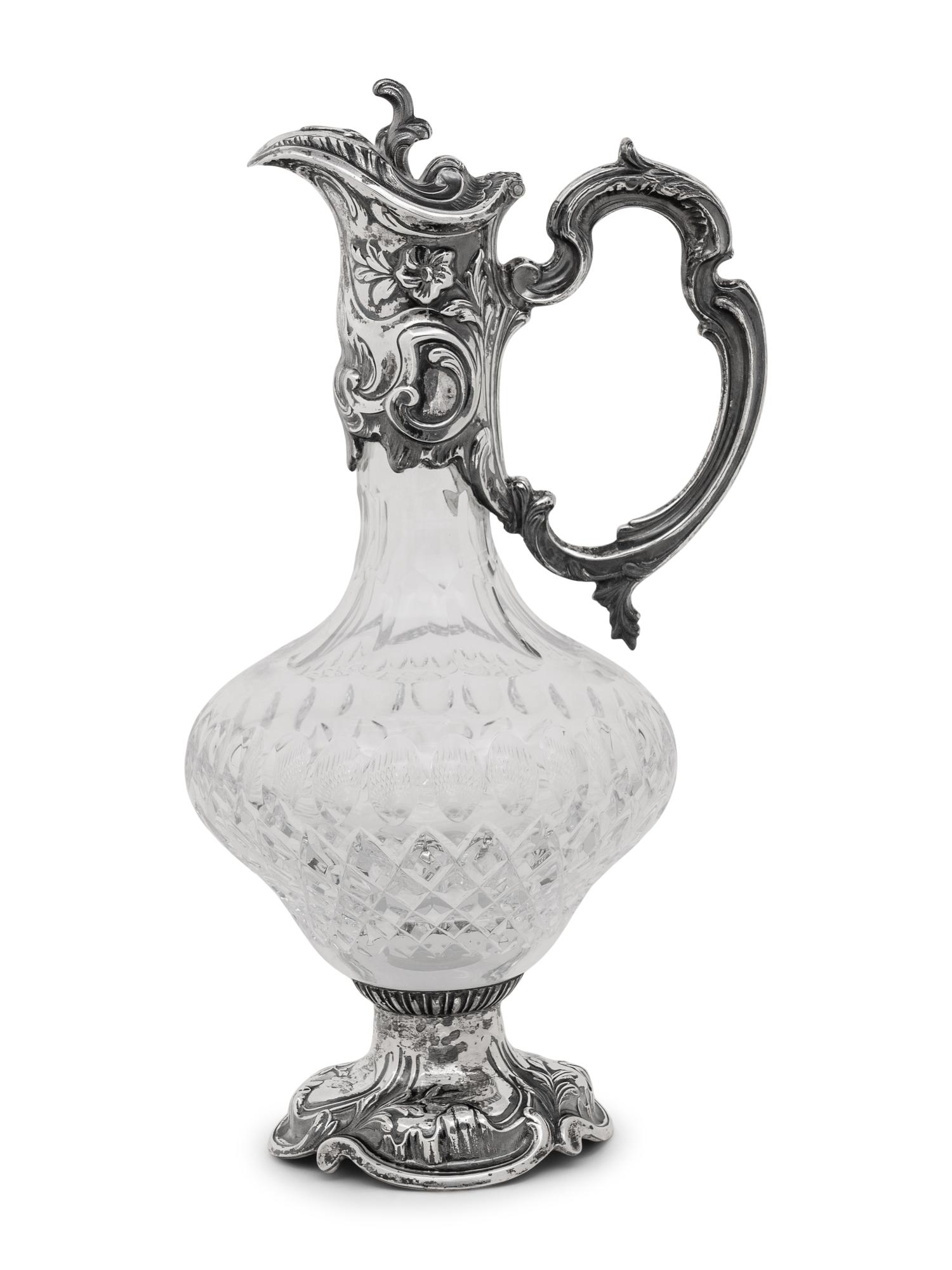 A Portuguese Silver Mounted Cut Glass Claret Jug