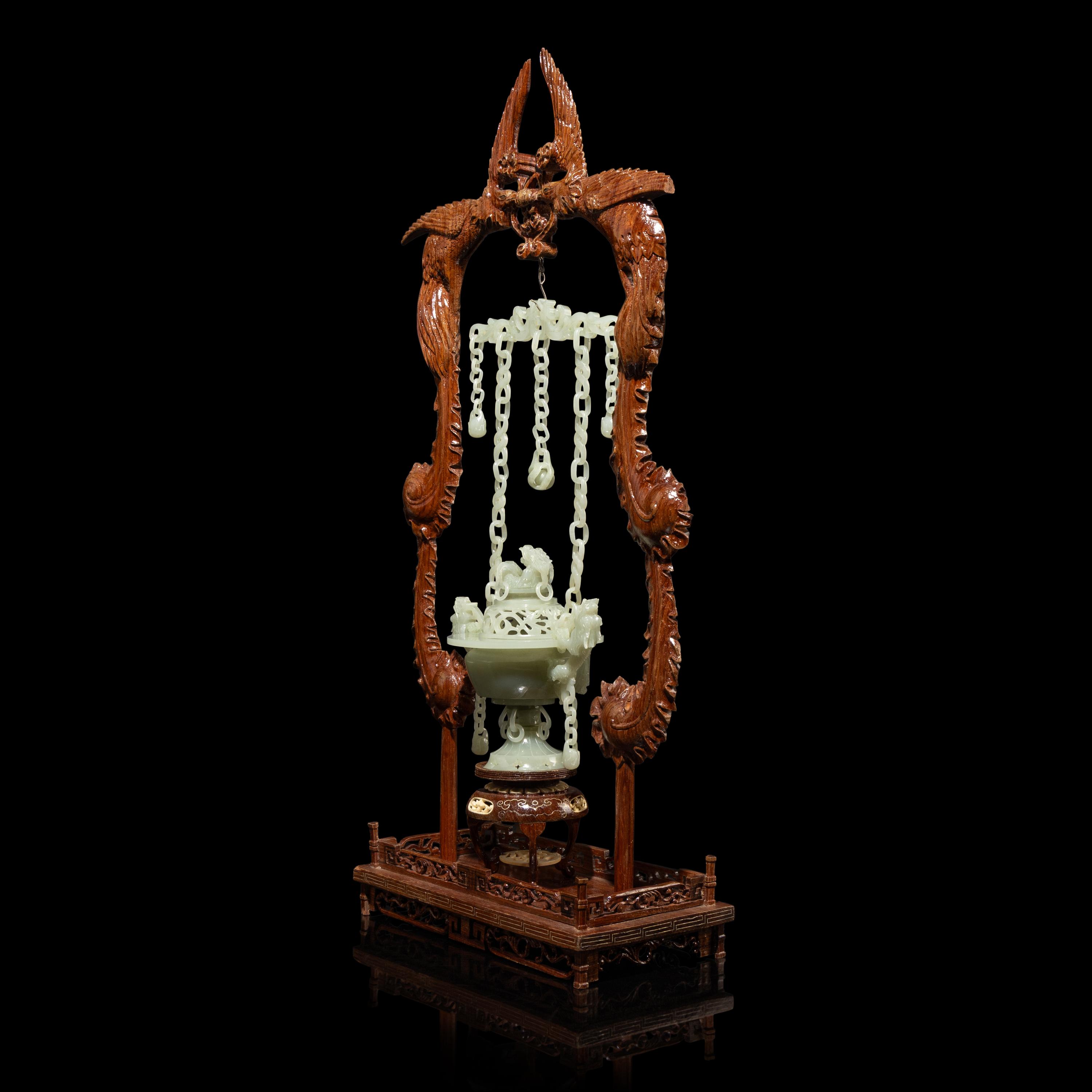 A Chinese Celadon Jade Hanging Incense Burner, 20th Century — 近代 青玉鏈式爐