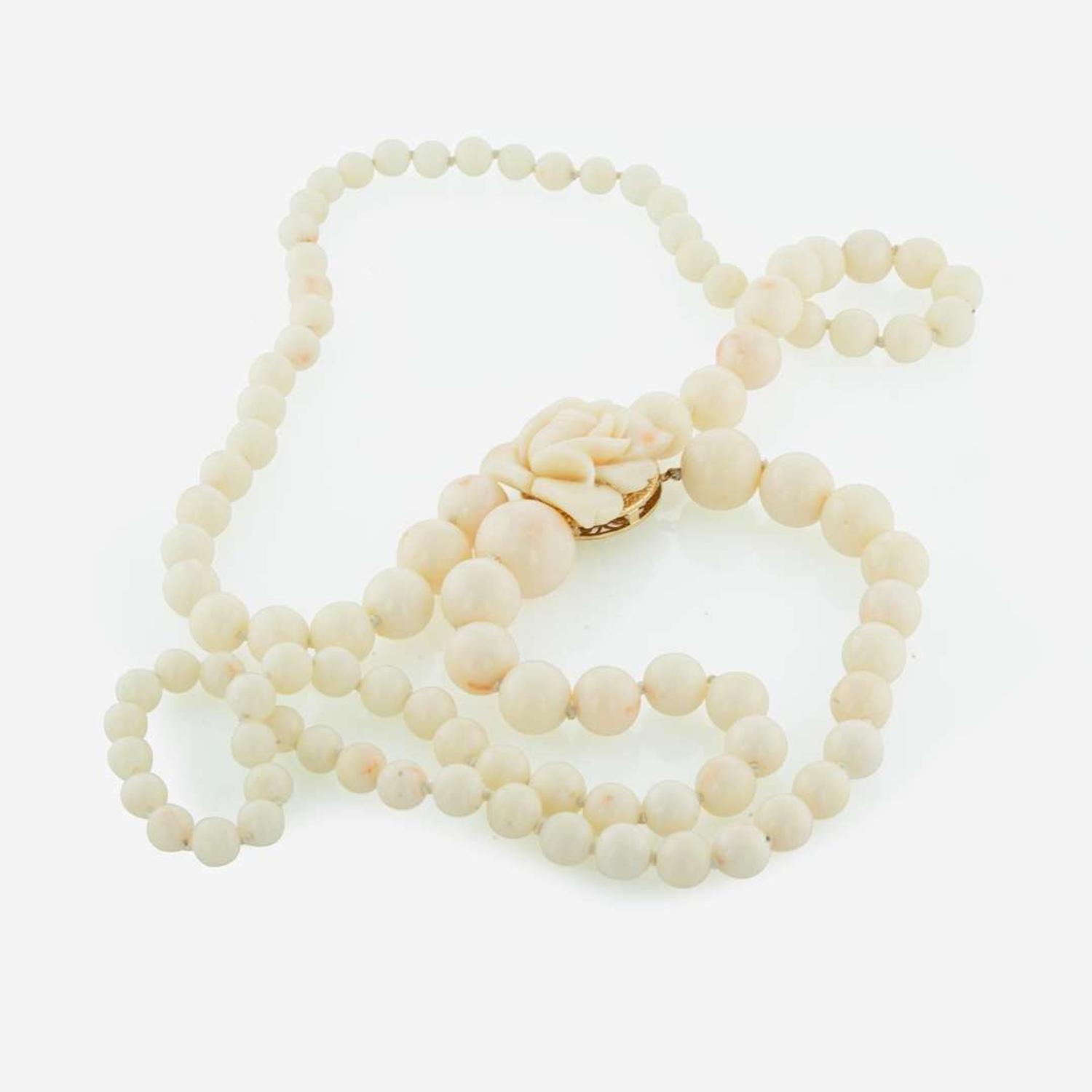 A Three Piece Collection of 14K Yellow Gold and Coral Jewelry