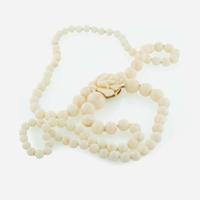 A Three Piece Collection of 14K Yellow Gold and Coral Jewelry