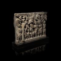 A Gandharan Grey Schist Relief Depicting Buddha Visiting Kashyapa, 2nd/3rd Century