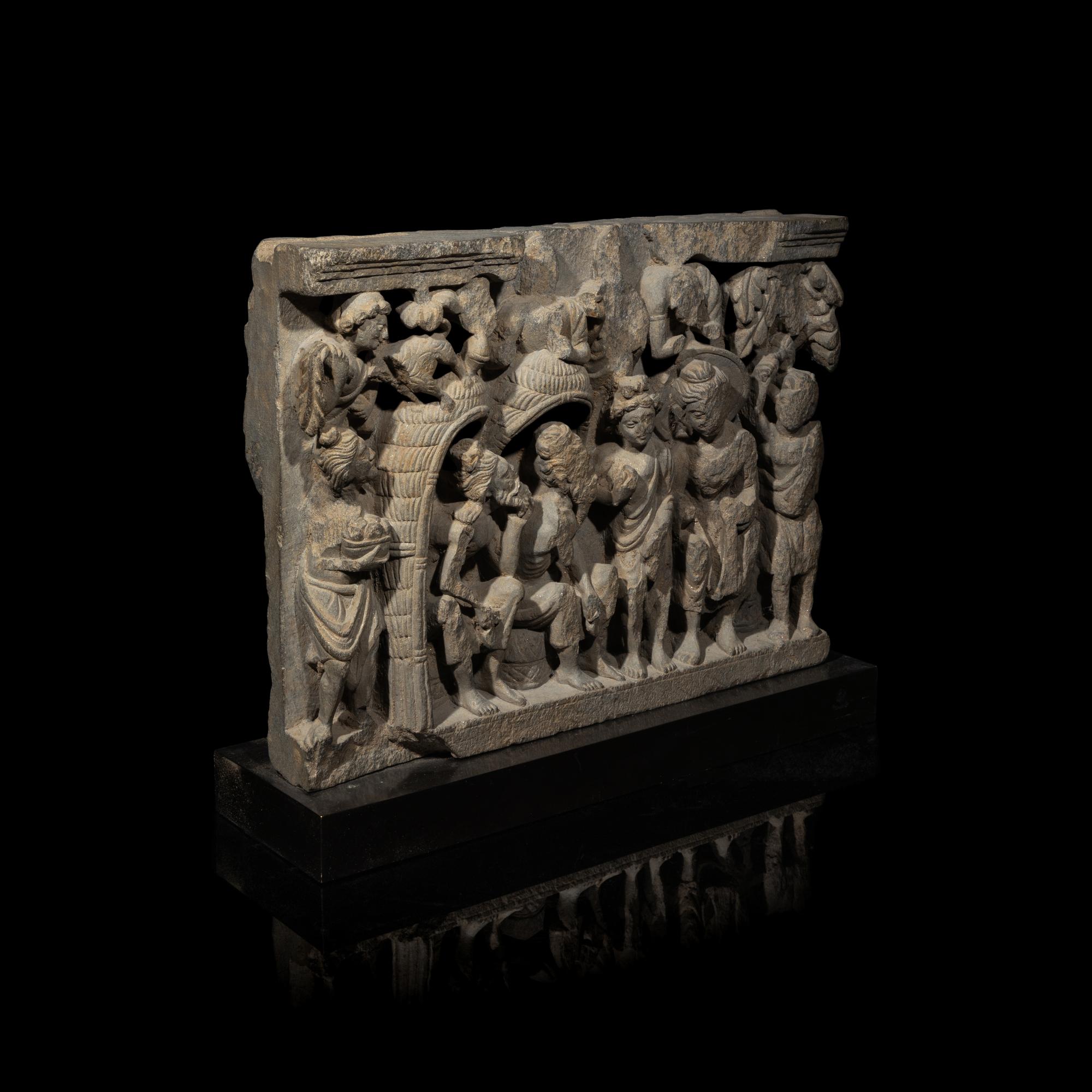 A Gandharan Grey Schist Relief Depicting Buddha Visiting Kashyapa, 2nd/3rd Century
