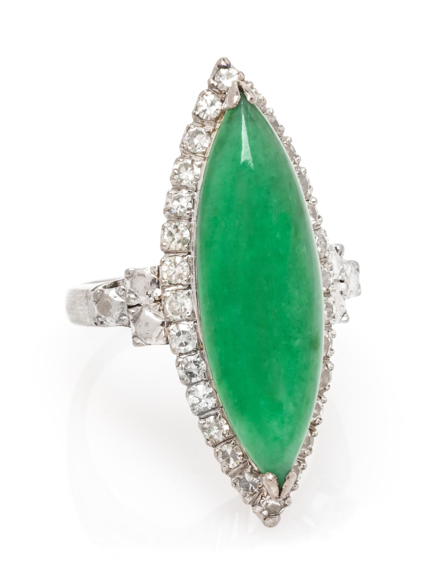 An 18 Karat White Gold, Jade and Diamond Ring, 4.20 dwts.