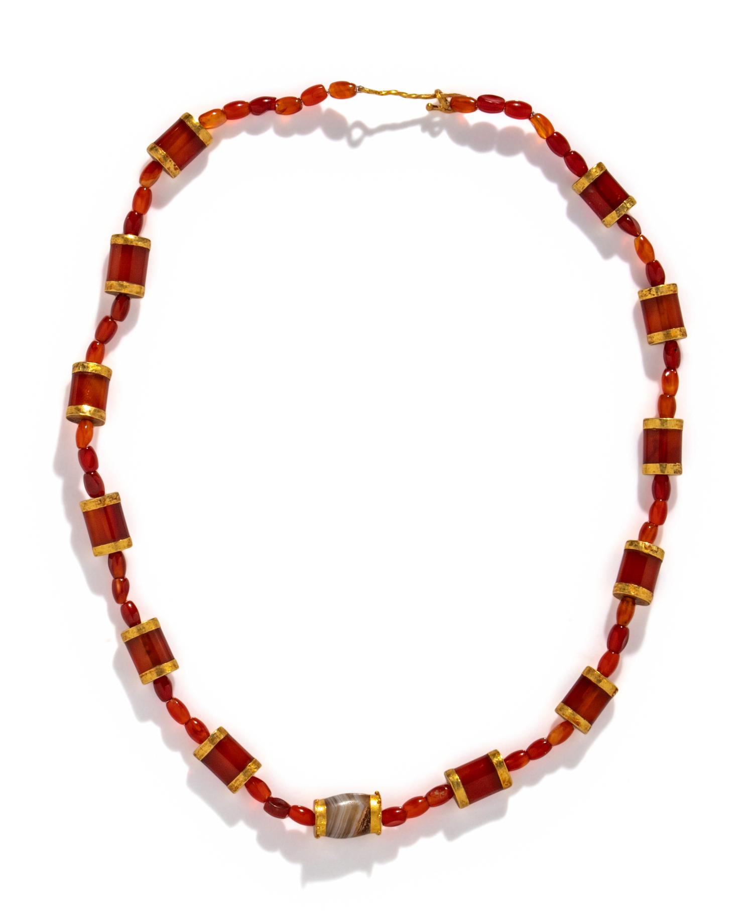 A Near Eastern Carnelian, Banded Agate, and Gold Bead Necklace