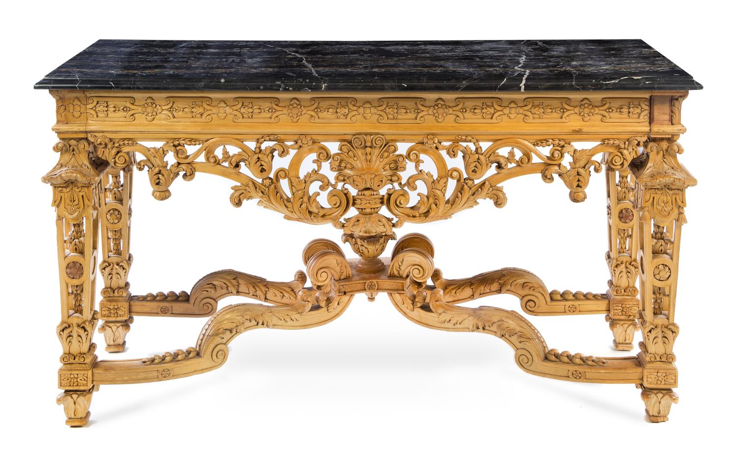 An Italian Carved Wood Center Table Height 36 x width 64 x depth 24 1/4 inches. — 19TH CENTURY