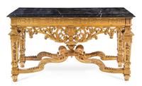 An Italian Carved Wood Center Table Height 36 x width 64 x depth 24 1/4 inches. — 19TH CENTURY