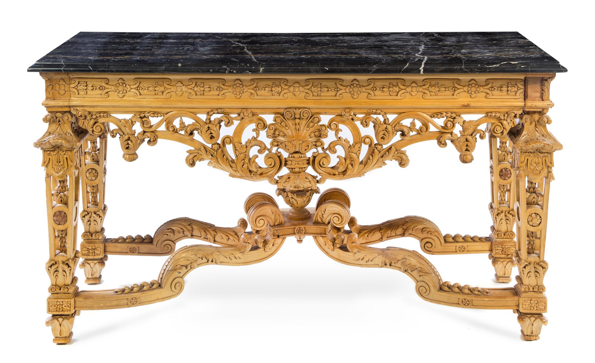An Italian Carved Wood Center Table Height 36 x width 64 x depth 24 1/4 inches. — 19TH CENTURY