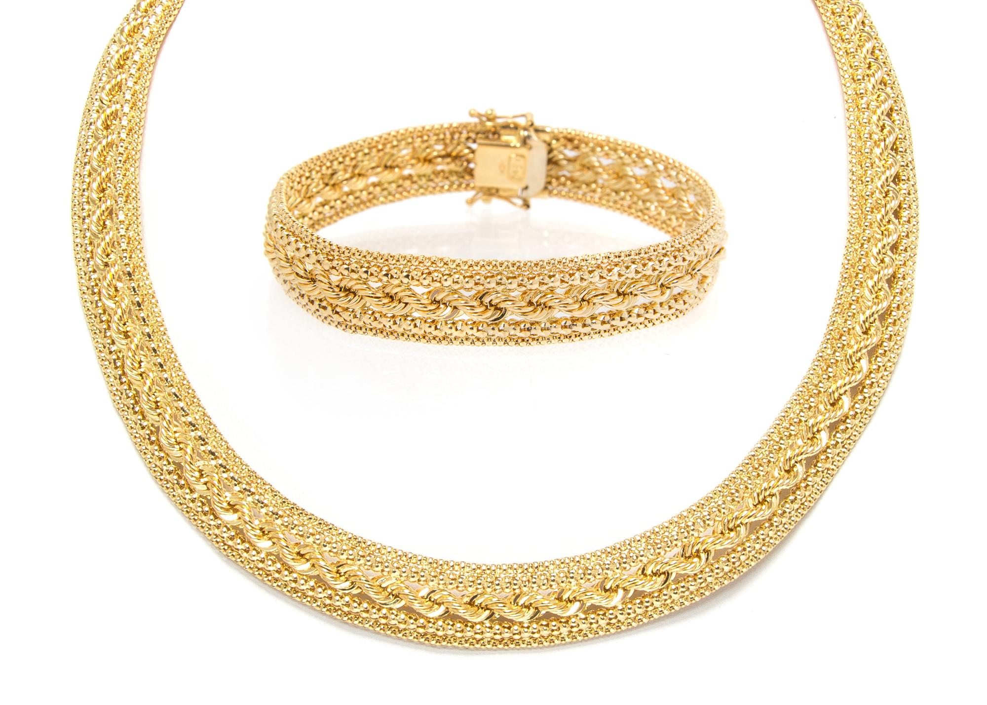 An 18 Karat Yellow Gold Fancy Link Demi Parure, 36.80 dwts.