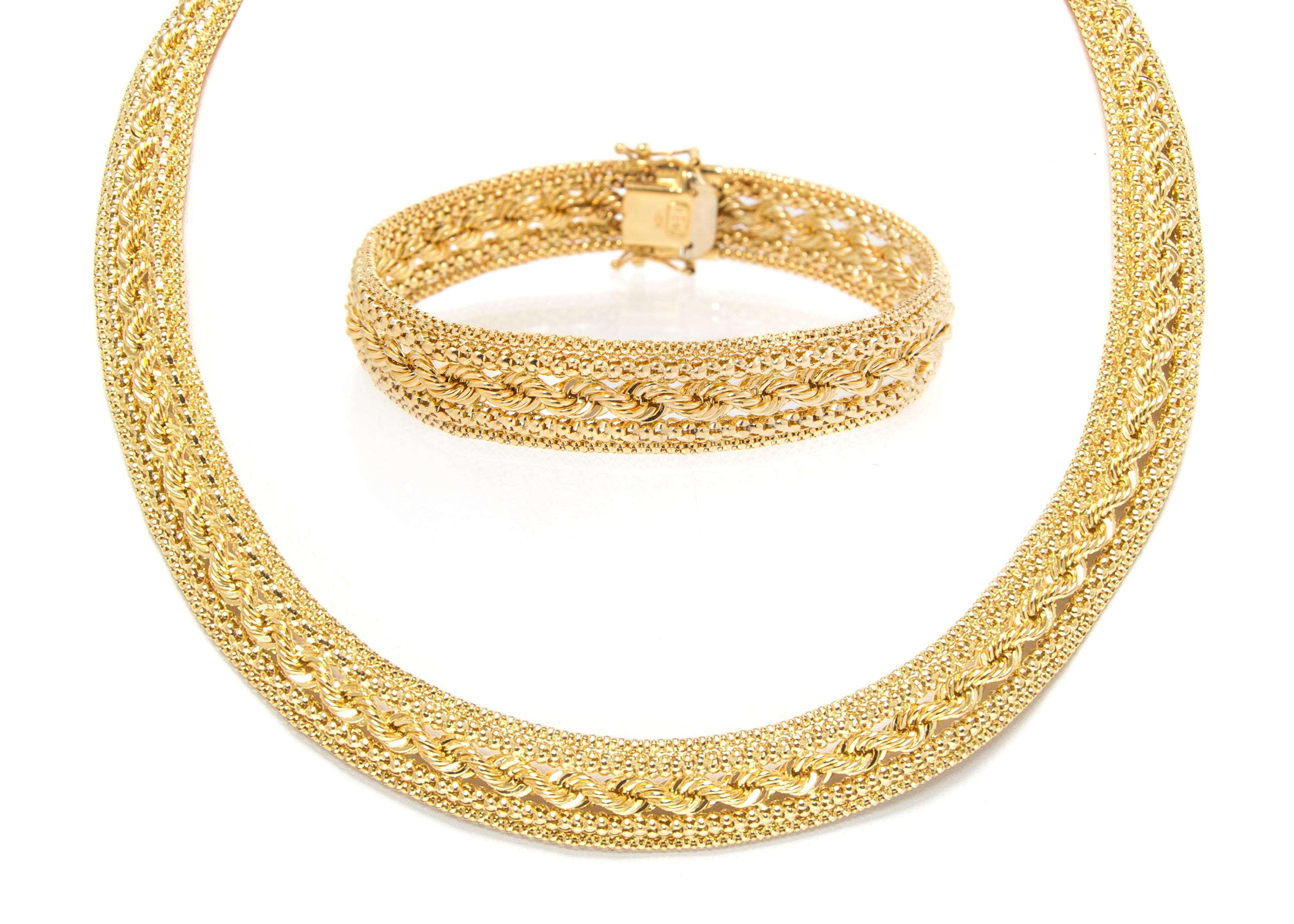 An 18 Karat Yellow Gold Fancy Link Demi Parure, 36.80 dwts.