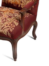 A Pair of Louis XV Walnut Fauteuils