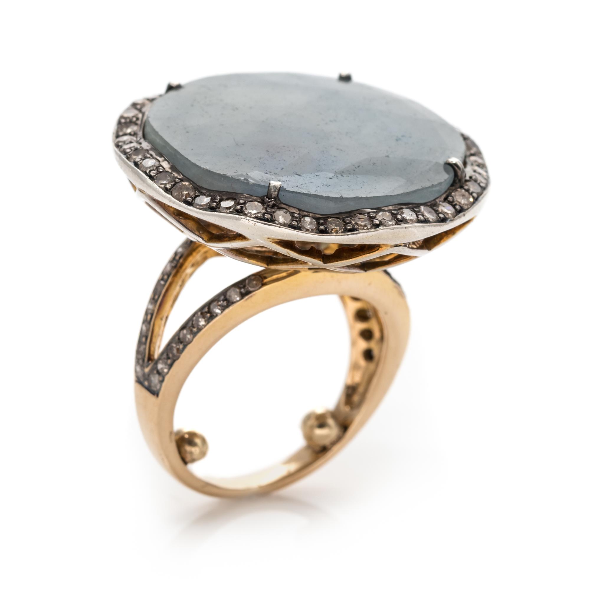 A Gilt Silver, Sapphire and Diamond Ring, 9.80 dwts.