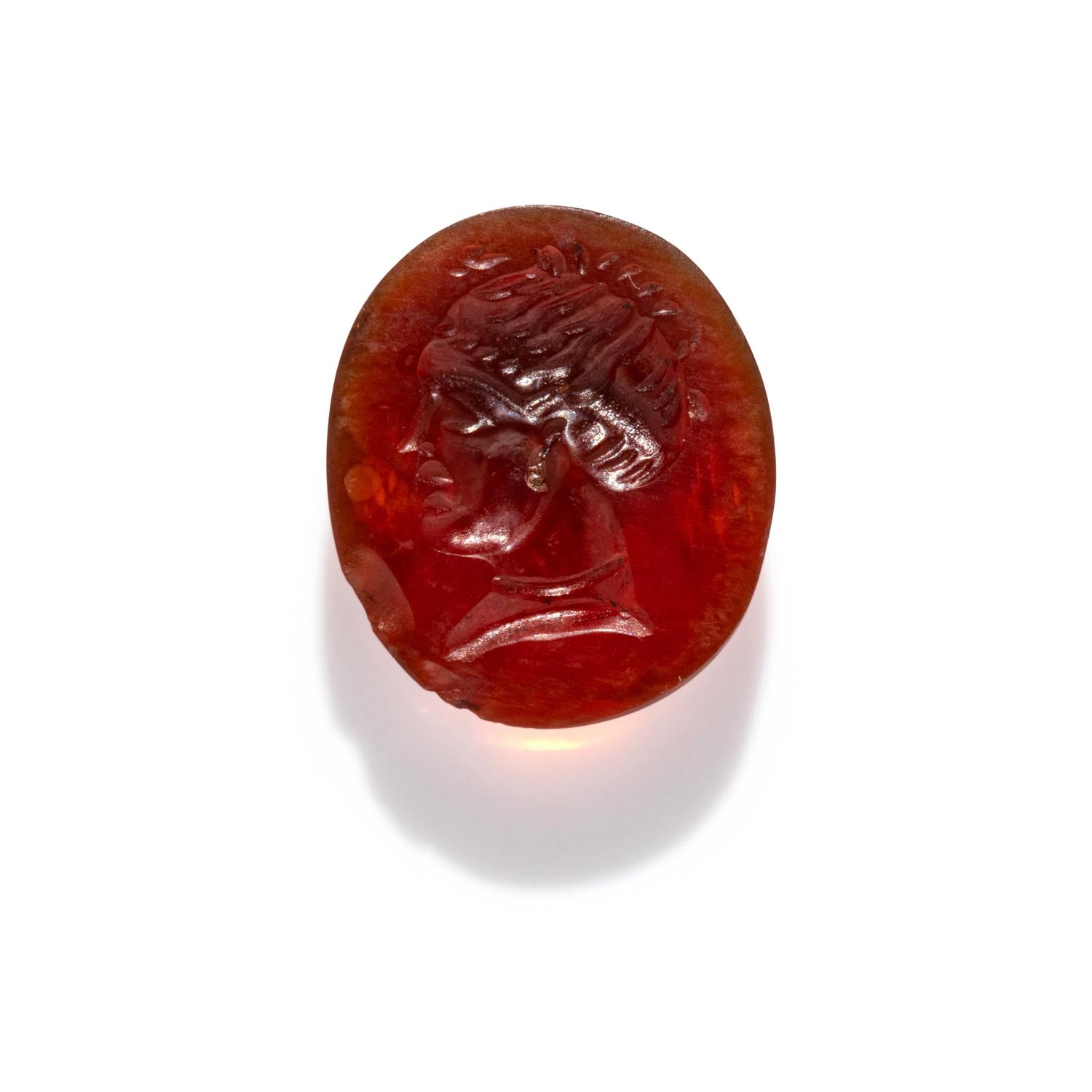 A Roman Carnelian Ring Stone with a Female Portrait Head