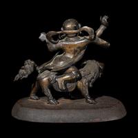 A Sino-Tibetan Bronze Figure of a Guardian