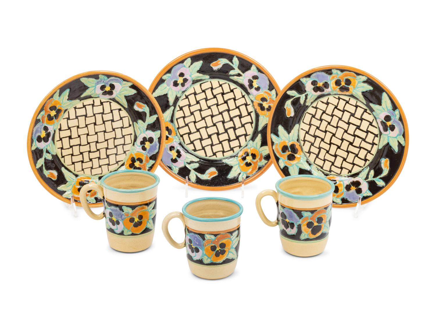 A Set of Dan Bleier Studio Ceramic Plates and Mugs