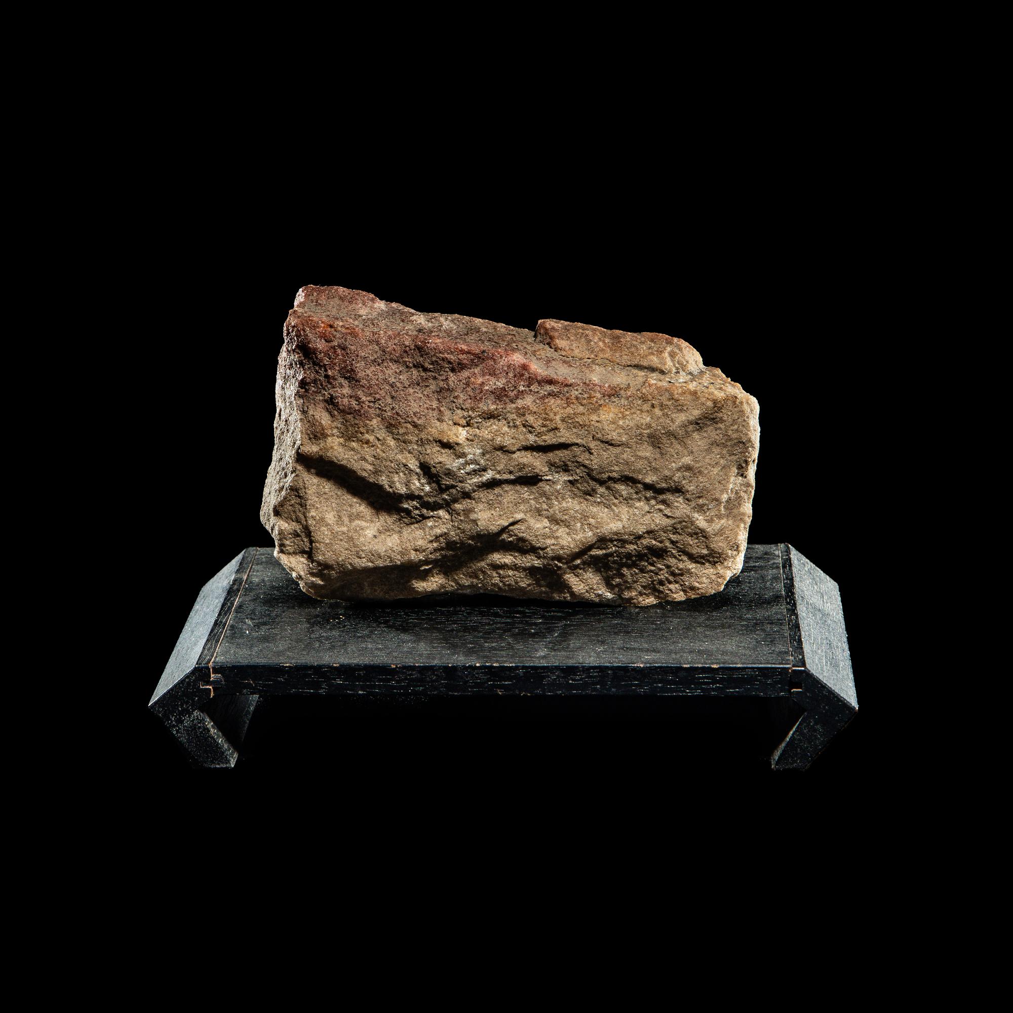 An Egyptian Limestone Fragment with Cartouche of Queen Nefertiti