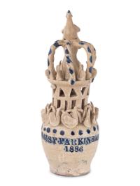 A Pair of Cobalt Decorated Stoneware Puzzle Banks