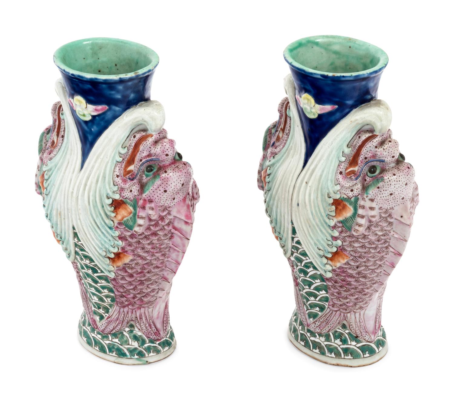 A Pair of Chinese Famille Rose 'Capricorns' Porcelain Vases