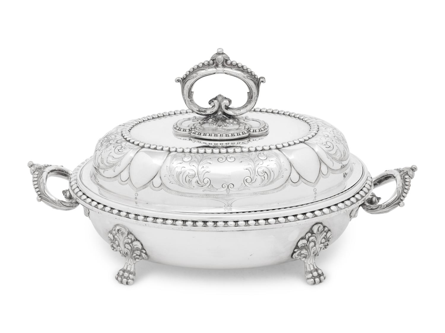 A Set of Four Victorian Silver-Plate Oval Vegetable Dishes with Covers and Liners