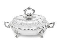 A Set of Four Victorian Silver-Plate Oval Vegetable Dishes with Covers and Liners
