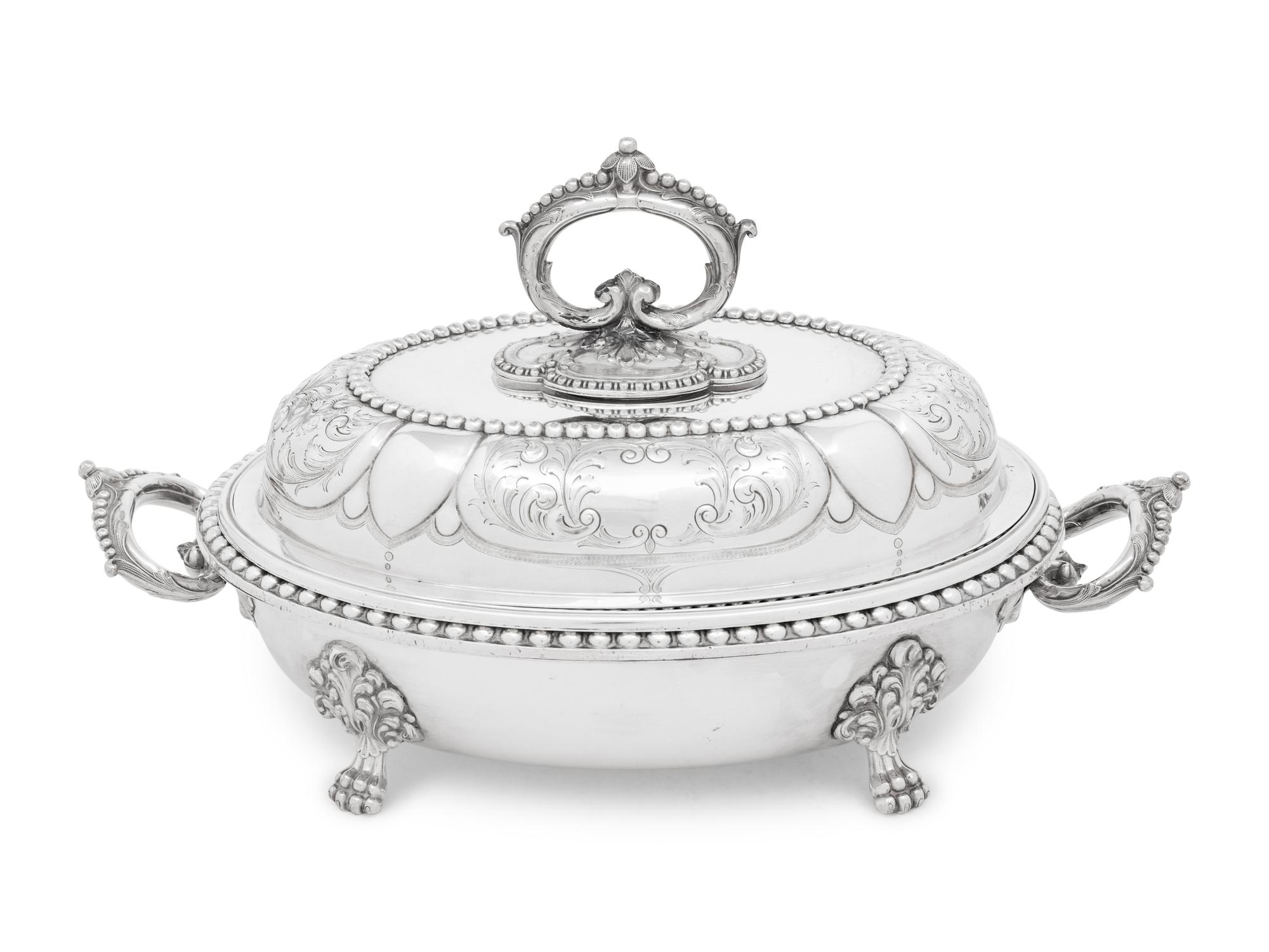 A Set of Four Victorian Silver-Plate Oval Vegetable Dishes with Covers and Liners