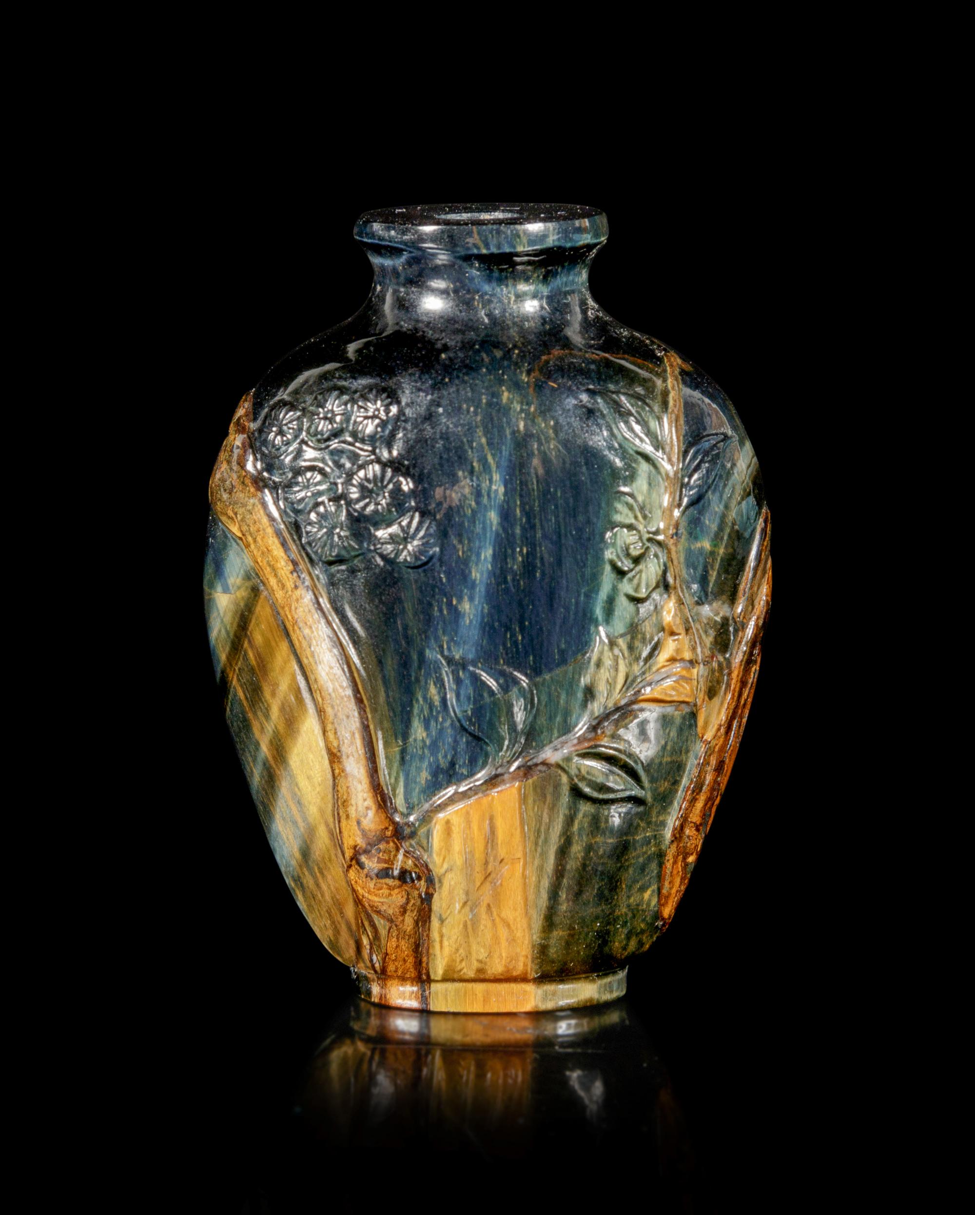 A Carved Tiger’s Eye Snuff Bottle