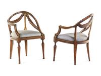A Pair of Italian Parcel Gilt Walnut Armchairs