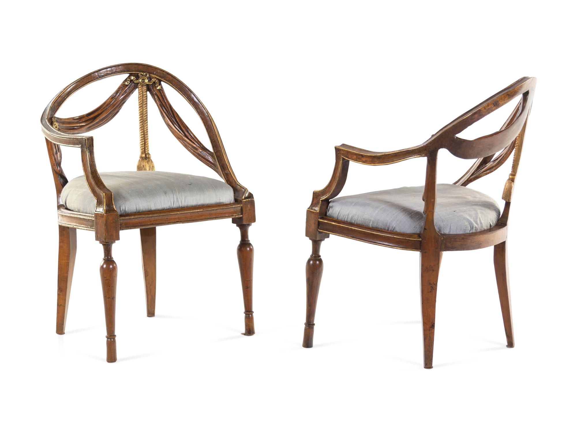 A Pair of Italian Parcel Gilt Walnut Armchairs