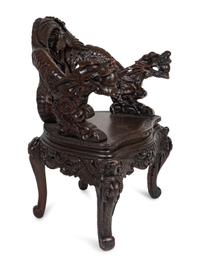 A Japanese Carved Hardwood Armchair