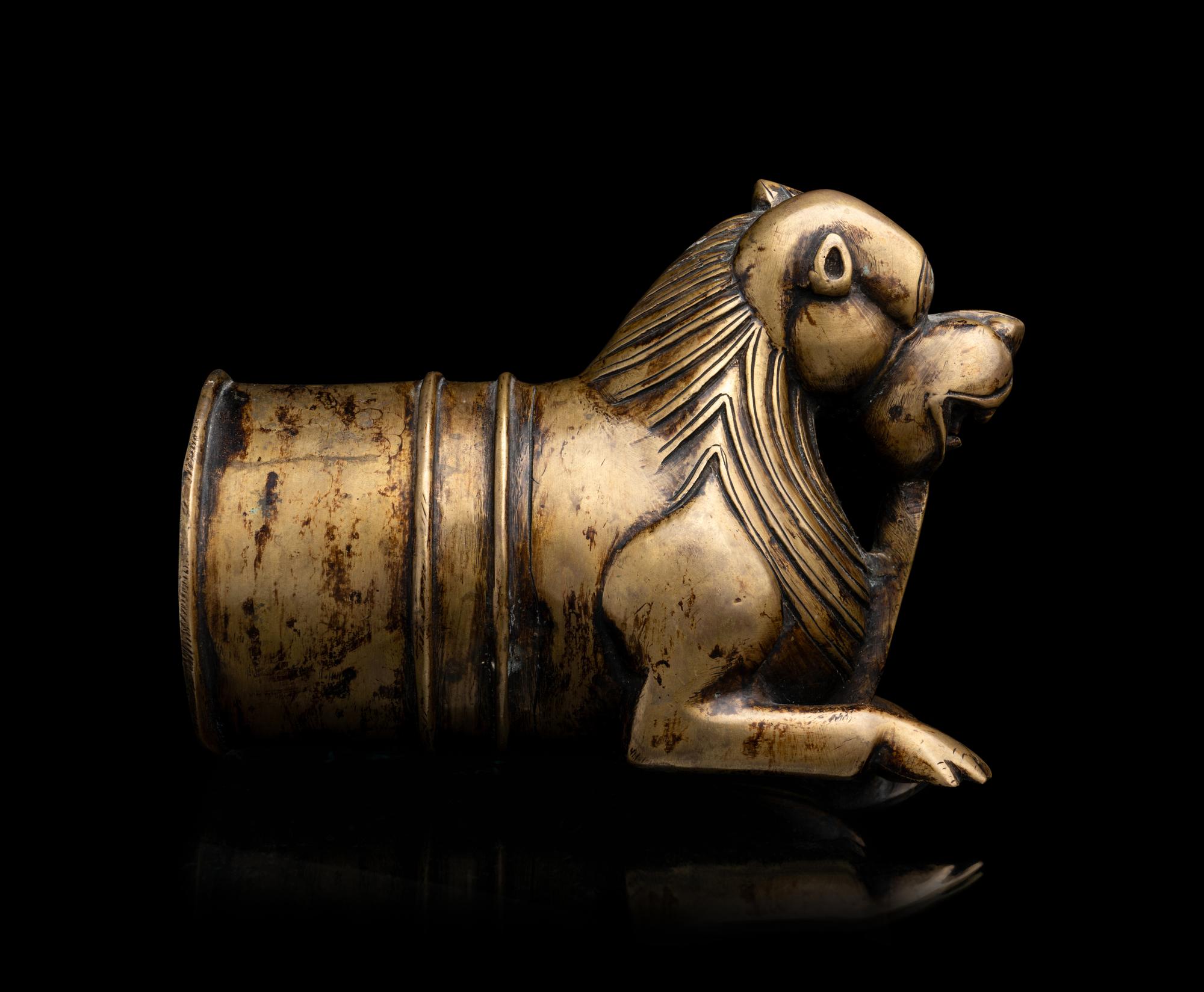 An Indian Cast Brass Lion-Form Palki Handle