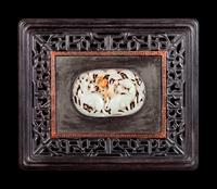 A Chinese Celadon Jade Inset Hardwood Panel
