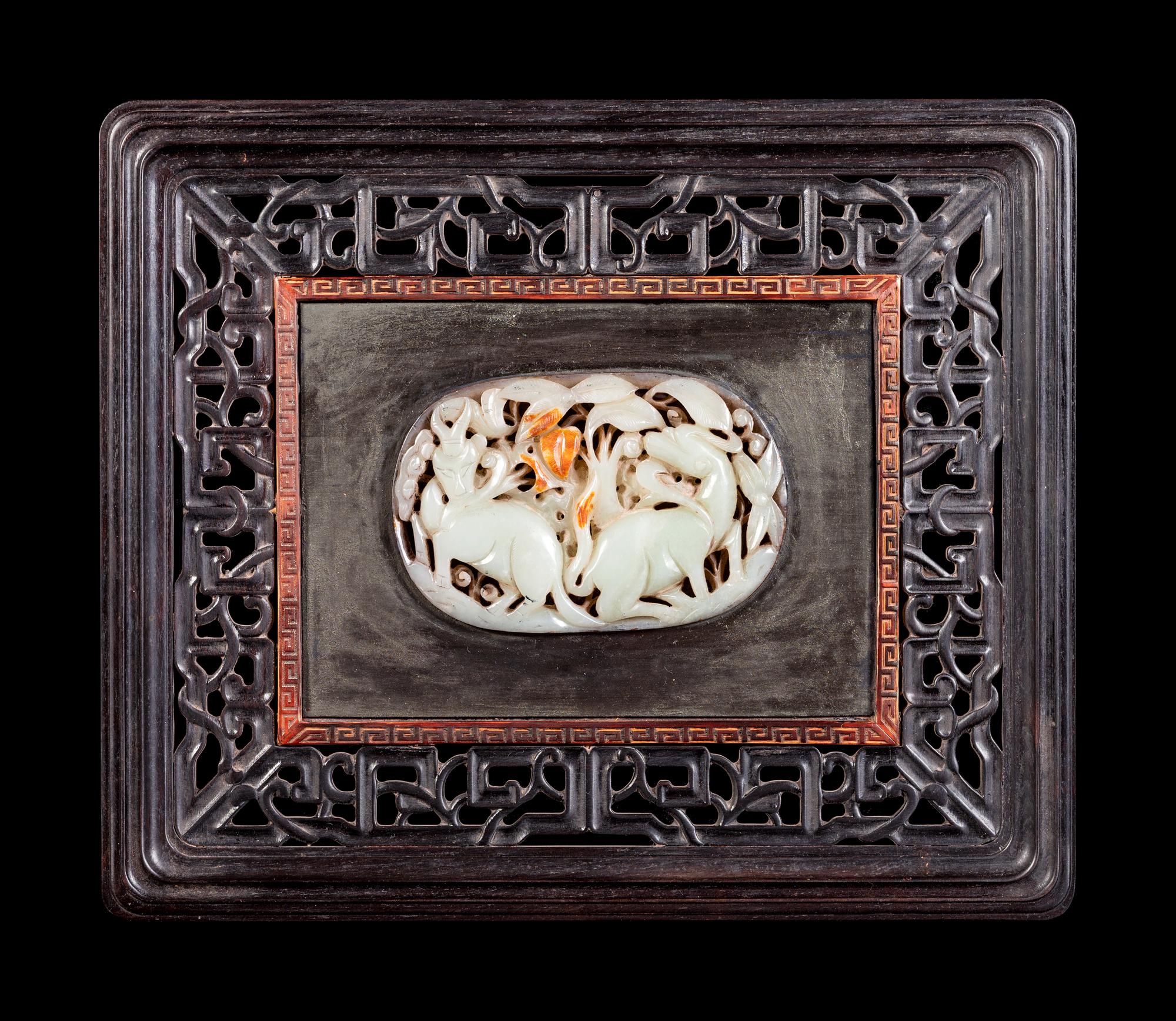 A Chinese Celadon Jade Inset Hardwood Panel
