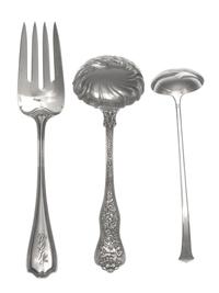 Two American Silver Serving Articles, Tiffany & Co., New York, NY, comprising a sauce ladle in the Olympian pattern monogrammed W and a