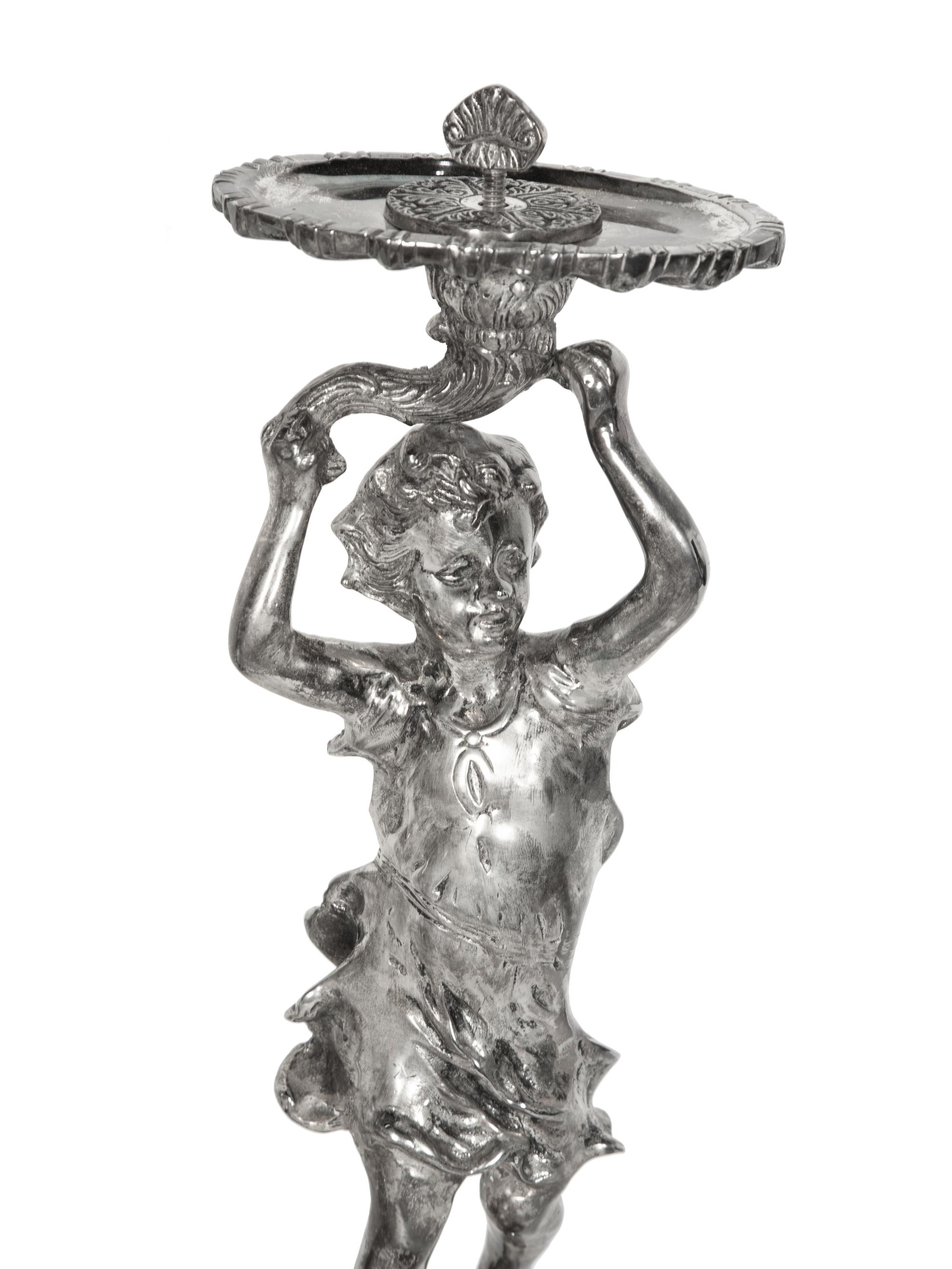 A Pair of Silvered Metal Figures