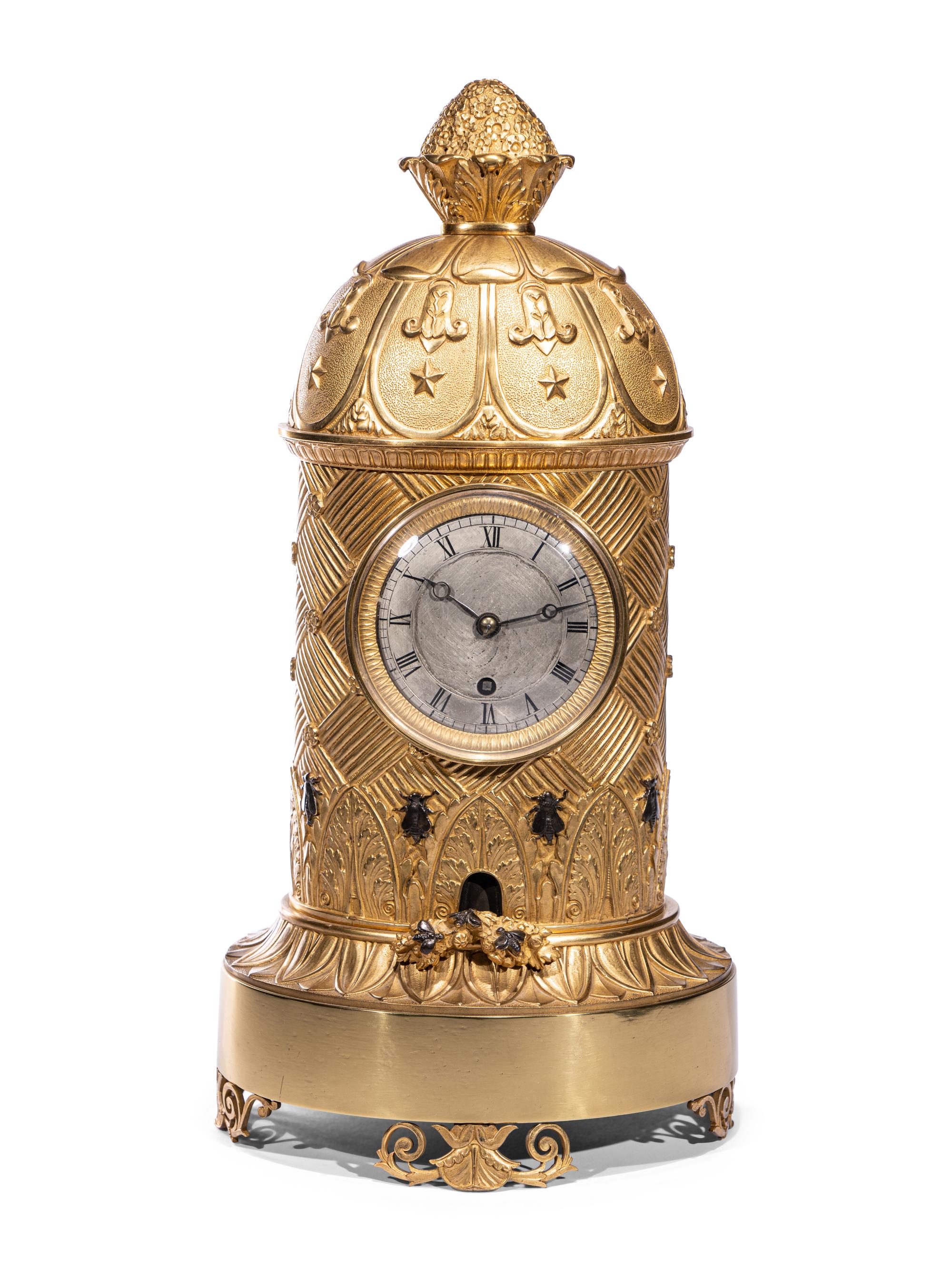 A Charles X Ormolu and Patinated Bronze Beehive Clock