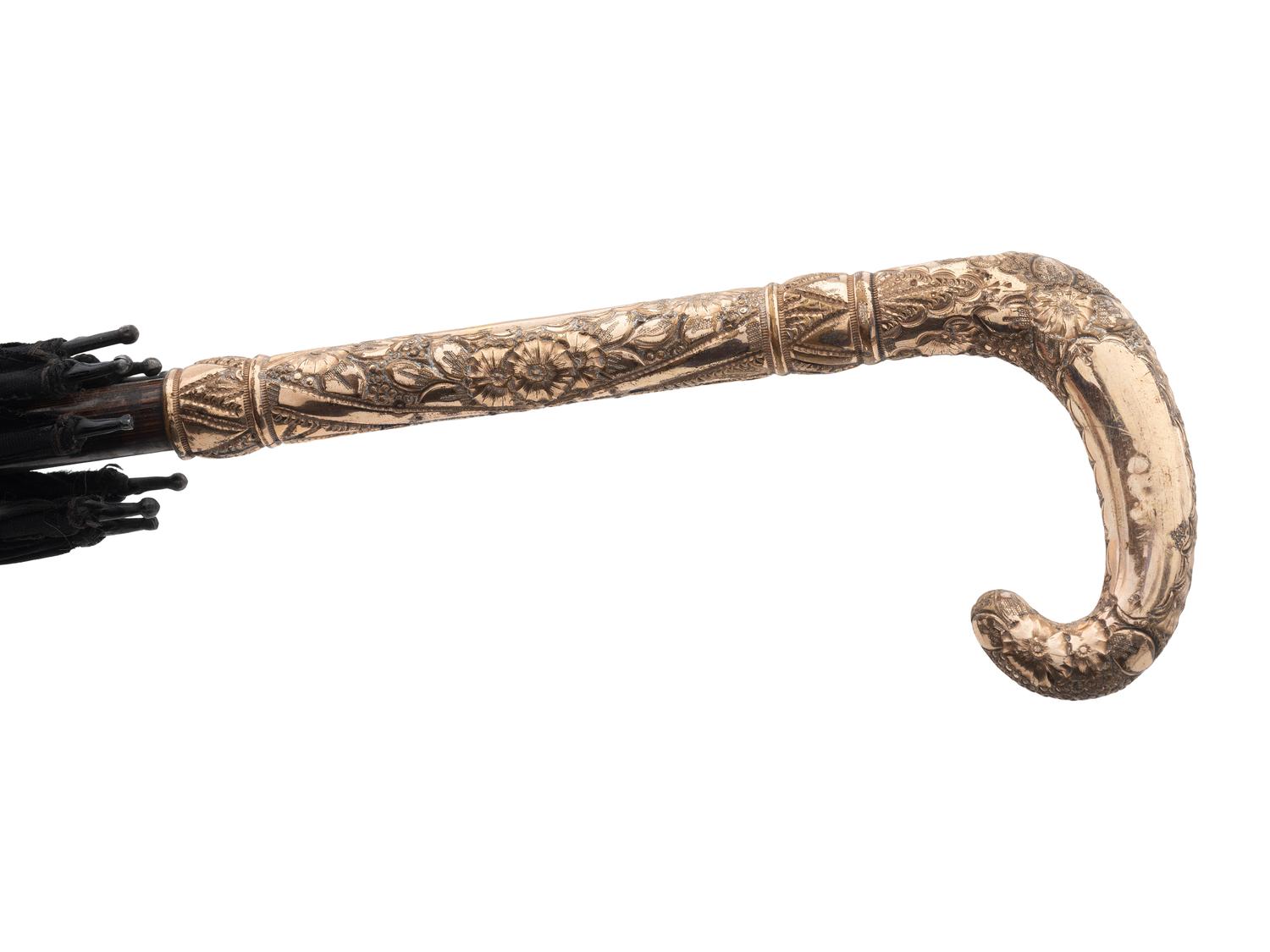 Four Gold Plated Handled Walking Sticks