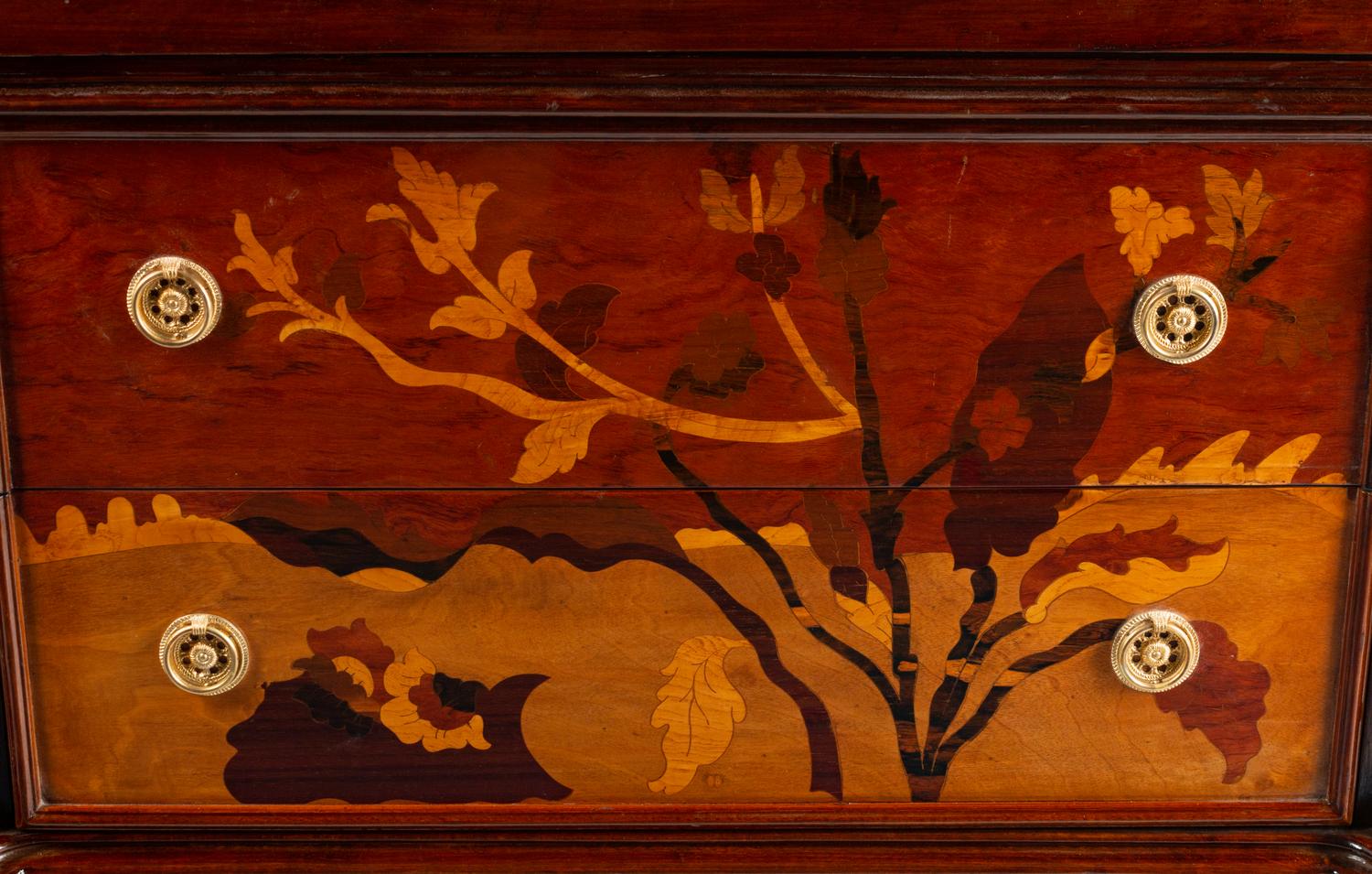 An Art Nouveau Style Inlaid Chest of Drawers