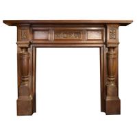 A Heavily Carved Mahogany Half Mantel with Pilasters 69" W x 11" D x 53.5" H — England, Circa 1880