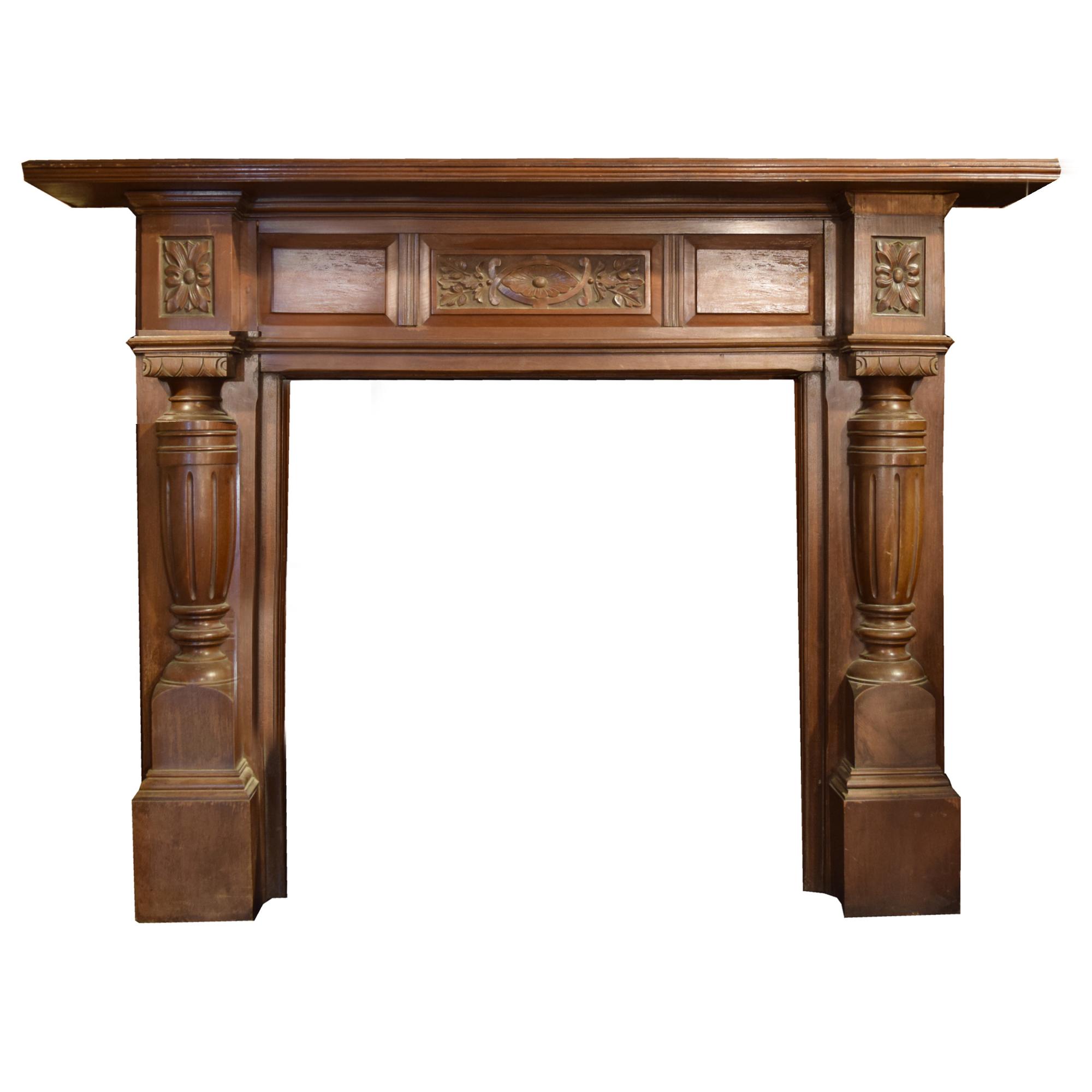 A Heavily Carved Mahogany Half Mantel with Pilasters 69" W x 11" D x 53.5" H — England, Circa 1880