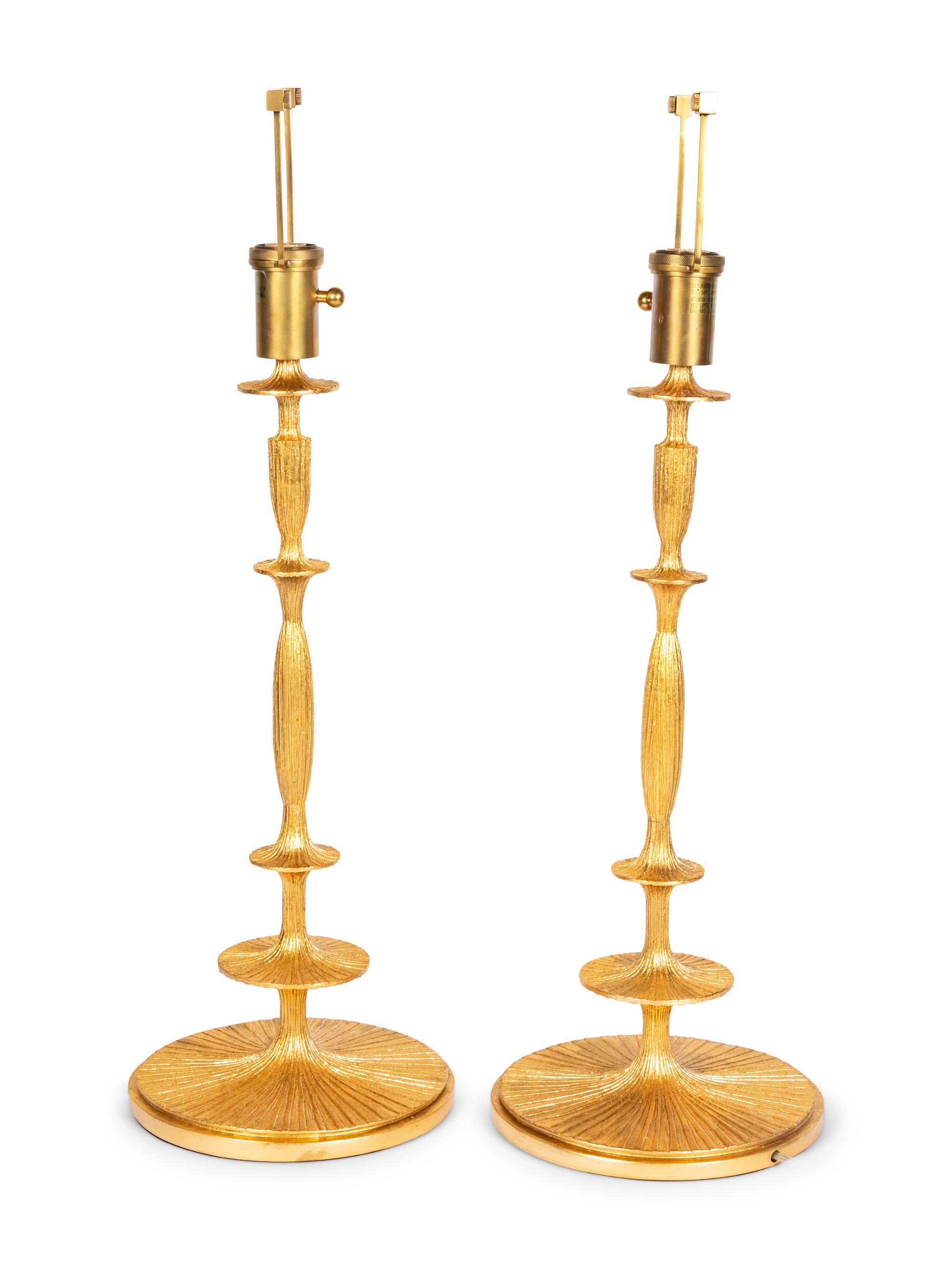 A Pair of Gilt Resin Table Lamps with Shades