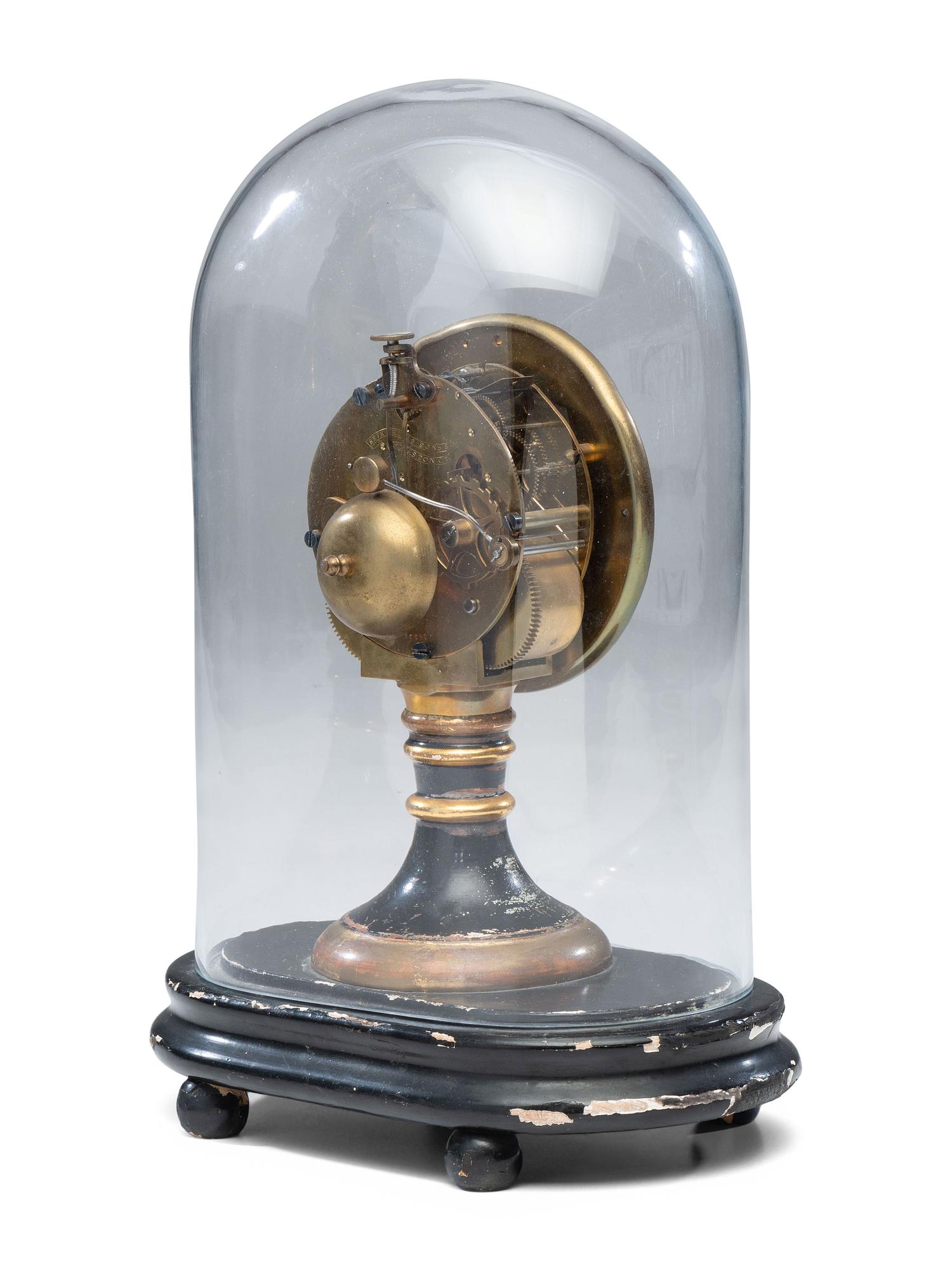 An Ebonized and Parcel Gilt Mantel Clock