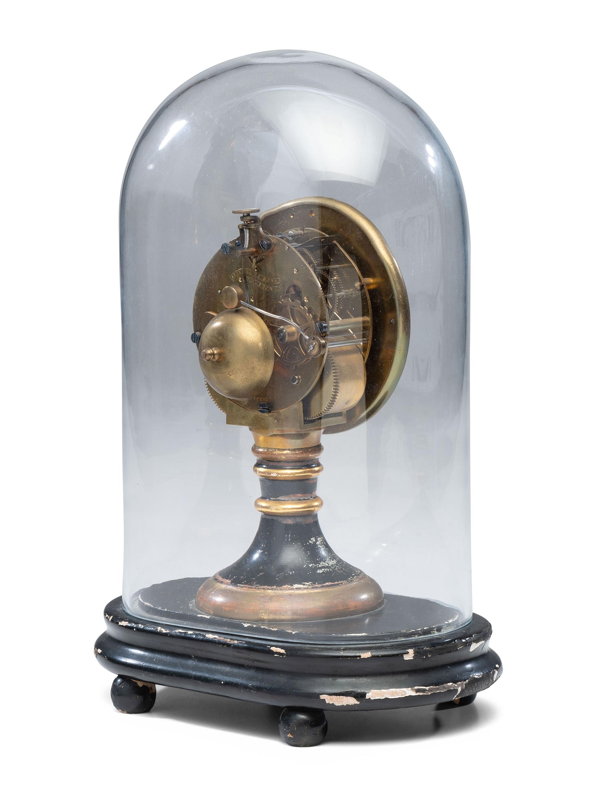 An Ebonized and Parcel Gilt Mantel Clock