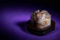 A Chinese White and Russet Jade Seal